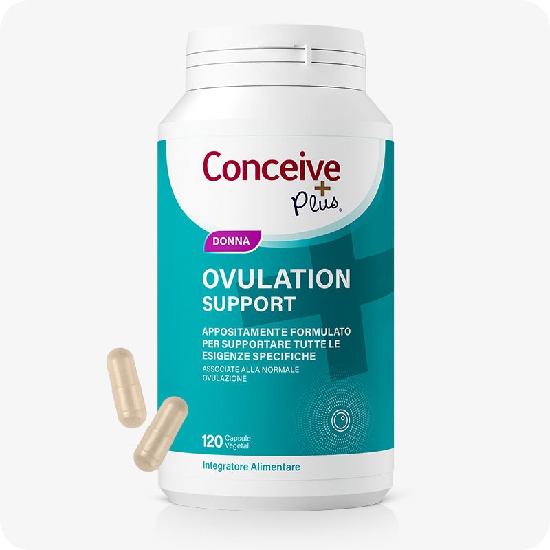 Conceive Plus Ovulation Support (IT) 120-capsule bottle with teal and white label, shown front-facing with two beige vegetable capsules floating beside it on a white background, designed to support women’s natural ovulation cycle.