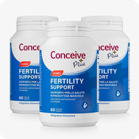 Conceive Plus Men's Fertility Support (IT) triple pack showing three supplement bottles with blue and white labels, each containing 60 capsules to support male reproductive health, arranged in a pyramid formation.